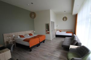 Postel nebo postele na pokoji v ubytování Hotel Hallormsstadur