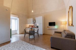 Televiisor ja/või meelelahutuskeskus majutusasutuses La Terrazza dei Ricordi