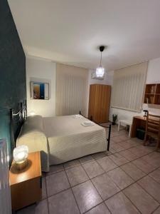 Postel nebo postele na pokoji v ubytování B&B Pokerdassi