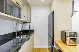 Kuchyň nebo kuchyňský kout v ubytování Estúdio em Andar Alto no Ibiza - IBI2210