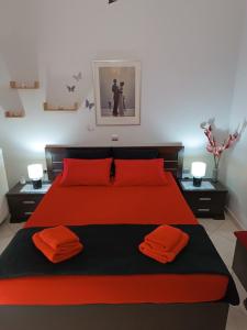 Katil atau katil-katil dalam bilik di RnB Red&Black