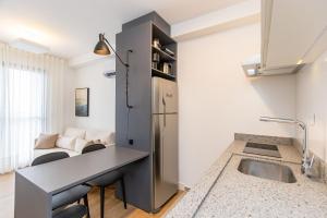 Kuchyň nebo kuchyňský kout v ubytování Apartamento de 2 Quartos com Garagem - IBI2309