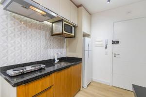 Køkken eller tekøkken på Studio no LOG Centro de Curitiba - LOG0311