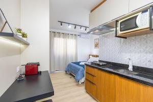 Køkken eller tekøkken på Studio no LOG Centro de Curitiba - LOG0311