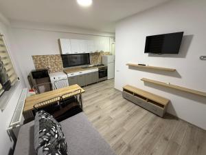 Η κουζίνα ή μικρή κουζίνα στο Silver Residence Caracal