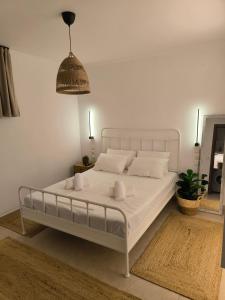 Postel nebo postele na pokoji v ubytování Simple Home