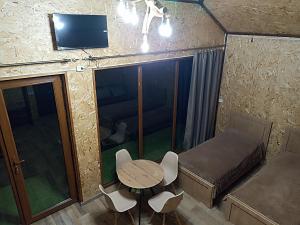 TV a/nebo společenská místnost v ubytování Green Paradise
