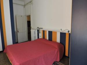 Postel nebo postele na pokoji v ubytování Albergo La Vela