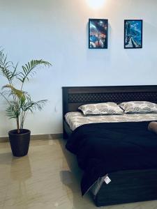 Ένα ή περισσότερα κρεβάτια σε δωμάτιο στο Oak & olive homestay