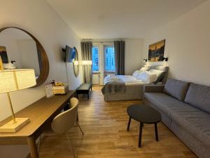 Ένα ή περισσότερα κρεβάτια σε δωμάτιο στο Solsta Hotell