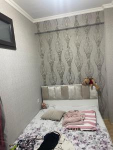 Ένα ή περισσότερα κρεβάτια σε δωμάτιο στο Cemila Home