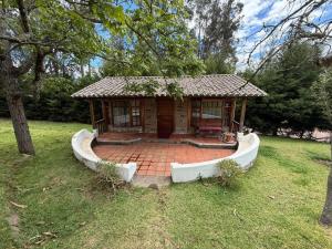 Un jardín fuera de Cabaña las tres Marias