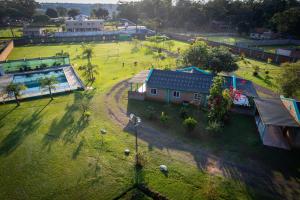 an aerial view of a park with a house at Mi Buen Refugio in Puerto Iguazú