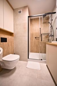Koupelna v ubytování Deluxe Apartament Pobitno + 3 fotografie