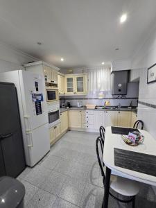 Kuchyň nebo kuchyňský kout v ubytování Paz House