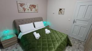 Ένα ή περισσότερα κρεβάτια σε δωμάτιο στο Angela apartments 01