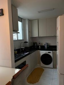 Køkken eller tekøkken på Lindo apartamento perto de Itu