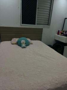 En eller flere senge i et værelse på Lindo apartamento perto de Itu