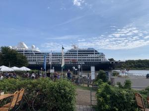 a cruise ship is docked in a harbor at Kanal 33 in Schafstedt