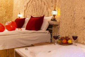 Postel nebo postele na pokoji v ubytování Ürgüp Masal pansiyon