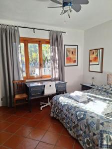 Ένα ή περισσότερα κρεβάτια σε δωμάτιο στο Casa Gatti, spacious accommodation on the ground floor +5 φωτογραφίες