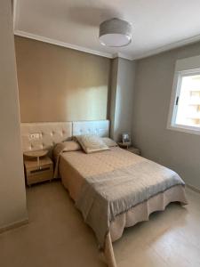 Postel nebo postele na pokoji v ubytování Anamar Dorada