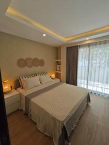 Postel nebo postele na pokoji v ubytování The summer sun beach hotel turgutreis