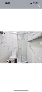 Koupelna v ubytování Le petit écrin de Deauville