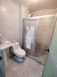 Koupelna v ubytování Departamento en zona residencial cerca del centro