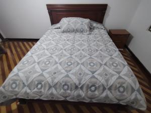 Postel nebo postele na pokoji v ubytování Departamento en zona residencial cerca del centro