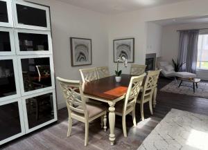 a dining room with a wooden table and chairs at Deluxe Room with Private Bathroom & Fast WiFi in San Francisco