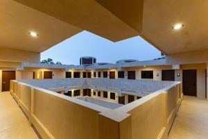 a view of a building with a roof at Hotel Pakal 58 Centro in Mérida