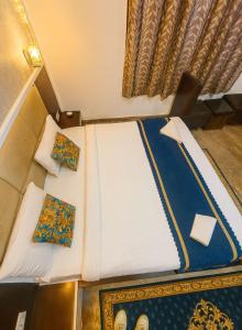 Una cama o camas en una habitación de Hotel Star Park View 4 fotos más