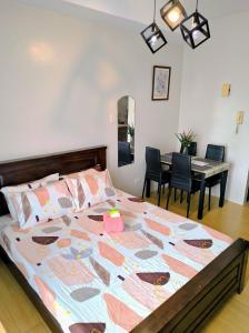 Postel nebo postele na pokoji v ubytování Lylo Pod at Vinia residences