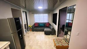 a living room with a couch and a window at Vélez Loft II in Vélez