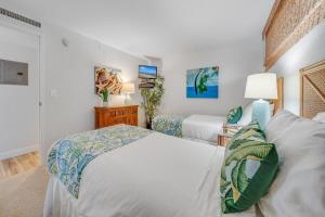 Ένα ή περισσότερα κρεβάτια σε δωμάτιο στο Kaanapali Shores 725 · KS 725 2BD in BeachFront Resort w Ocean V +54 φωτογραφίες