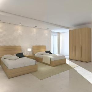 Postel nebo postele na pokoji v ubytování quietude da noite