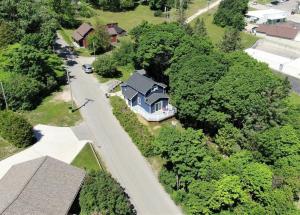 an aerial view of a house in the trees at The Blue Bliss in Saint Ignace