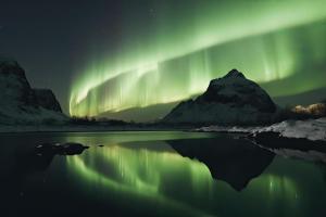 an image of the aurora dancing in the sky at Seaview Greenland 