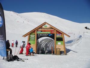 a small building on the side of a ski slope at Chalet Clementine in Oz
