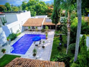 an aerial view of a house with a swimming pool at Beautiful Rooms at Villa La Floresta in Ajijic