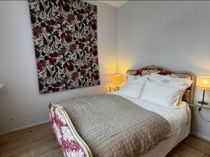 Postel nebo postele na pokoji v ubytování Charming Stay in the Heart of Vittel