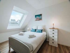 Ένα ή περισσότερα κρεβάτια σε δωμάτιο στο Holiday home just 350 m from the long sandy beach