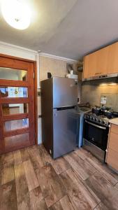 Η κουζίνα ή μικρή κουζίνα στο Alojamiento Curicó