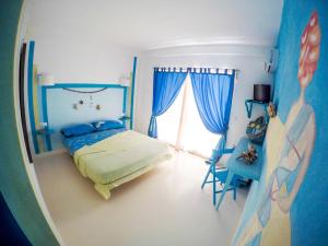 Ένα ή περισσότερα κρεβάτια σε δωμάτιο στο Pensaò Big Game Maio