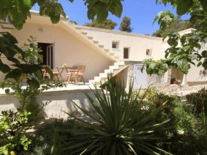 Balkón nebo terasa v ubytování Four Bedroom Holiday Home with Pool