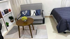 Ένα ή περισσότερα κρεβάτια σε δωμάτιο στο SMDC Style Residence
