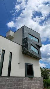 a building with a design on the side of it at Private room in a residential area in Hospet