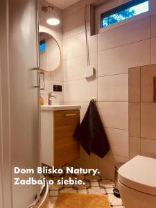 Ένα μπάνιο στο Dom Blisko Natury Boszkowo Letnisko Dom B