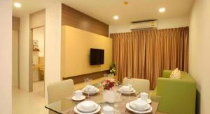 TV a/nebo společenská místnost v ubytování Landmark Residence + 17 fotografií